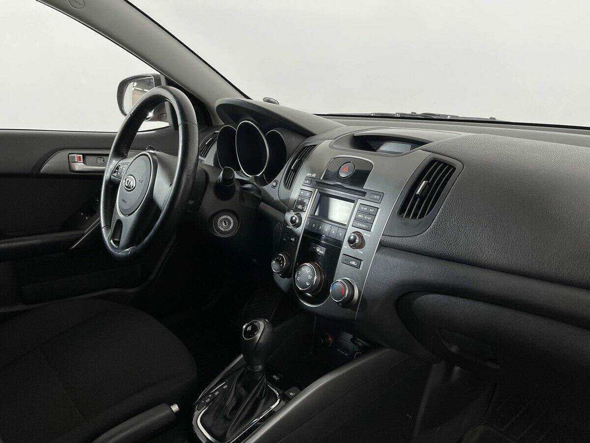Kia Cerato 2011 года с пробегом. Фото: #6