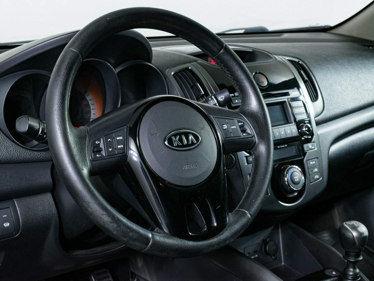 Kia Cerato 2012 года с пробегом. Фото: #13
