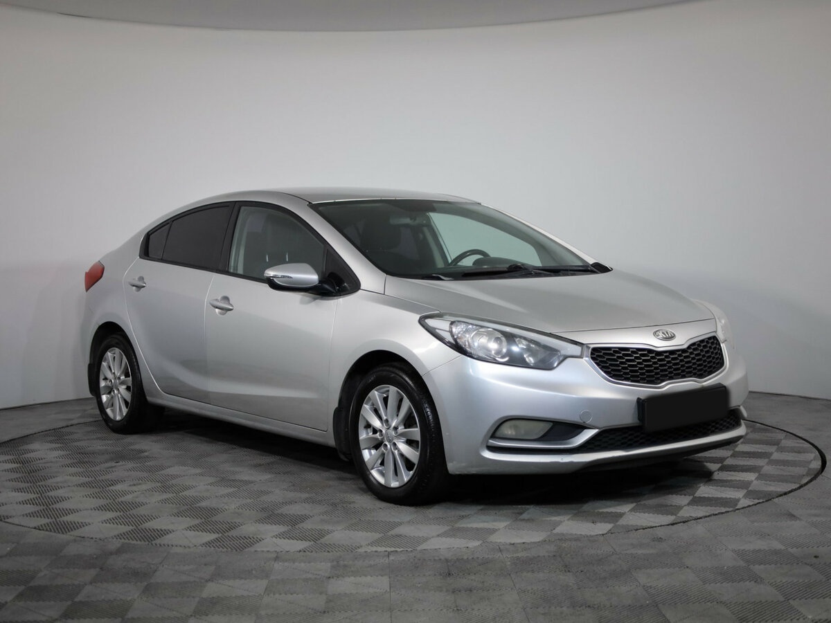 Kia Cerato 2013 года с пробегом. Фото: #2