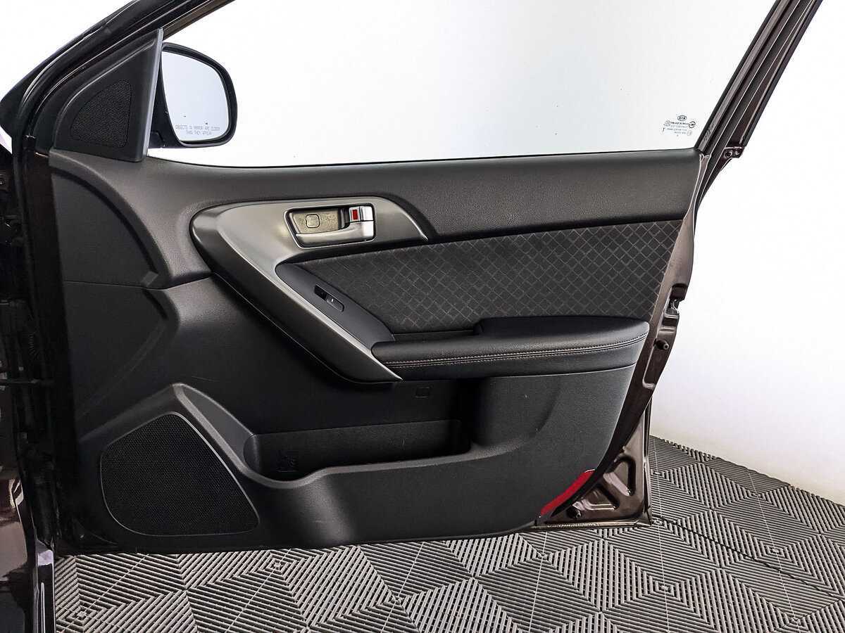 Kia Cerato 2011 года с пробегом. Фото: #23