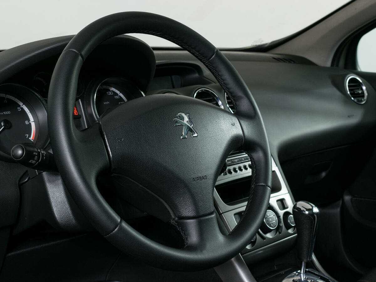 Peugeot 308 2011 года с пробегом. Фото: #10