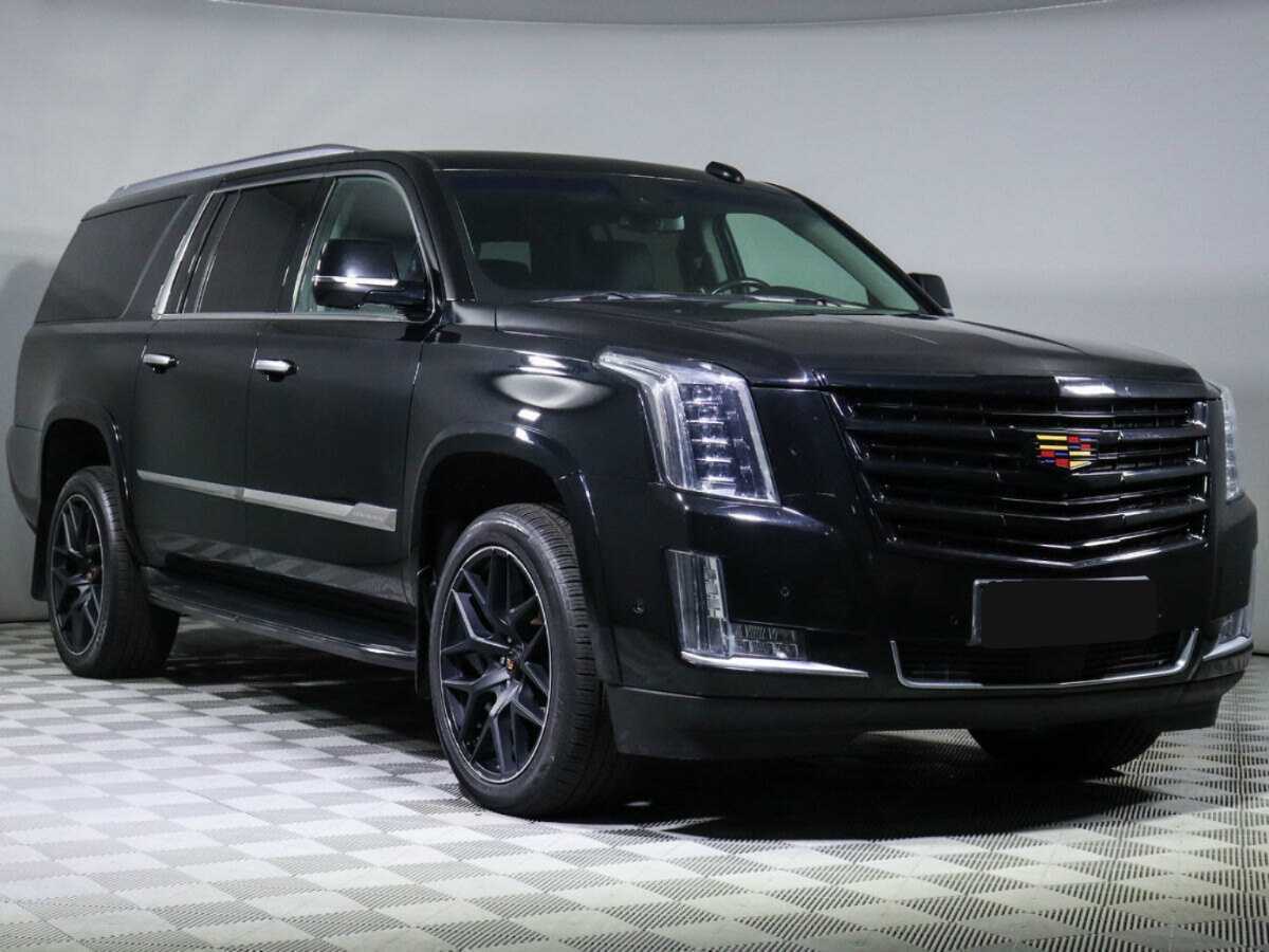 Cadillac Escalade 2018 года с пробегом. Фото: #1