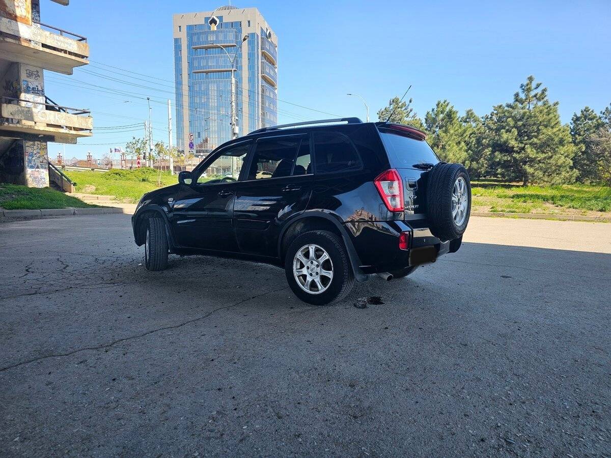 Chery Tiggo (T11) 2013 года с пробегом. Фото: #11