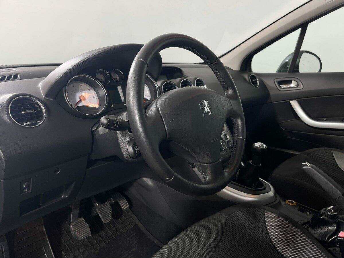 Peugeot 308 2009 года с пробегом. Фото: #12