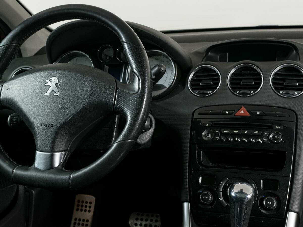Peugeot 308 2011 года с пробегом. Фото: #11
