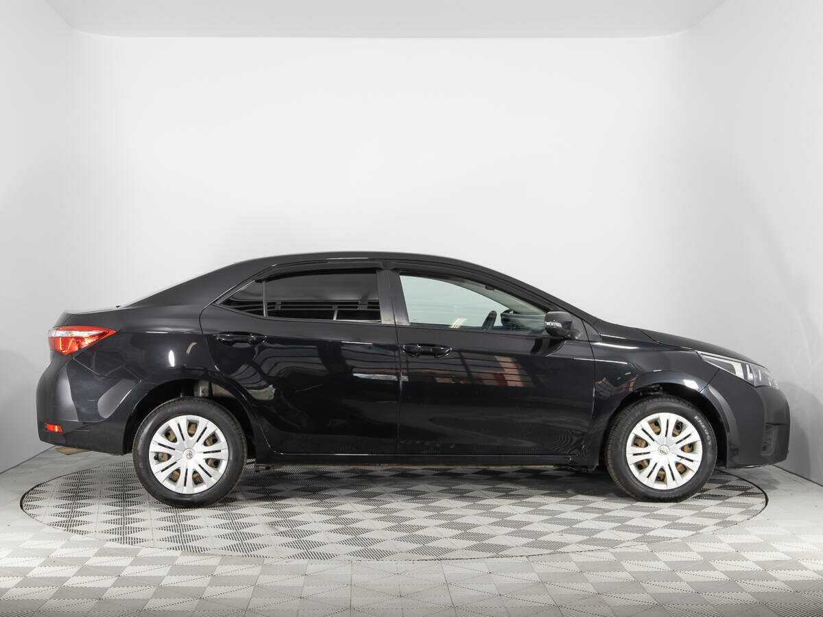 Toyota Corolla 2014 года с пробегом. Фото: #3