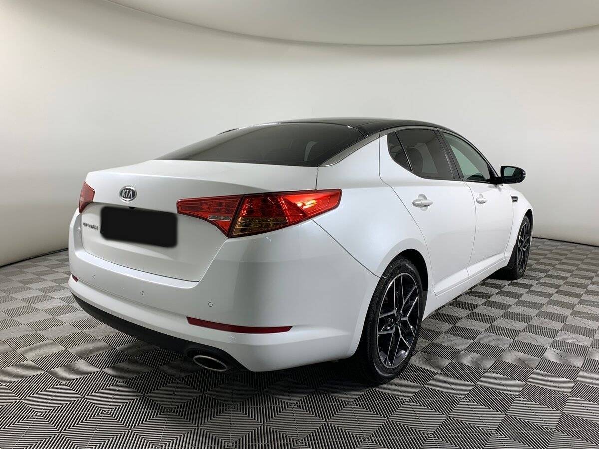 Kia Optima 2011 года с пробегом. Фото: #4