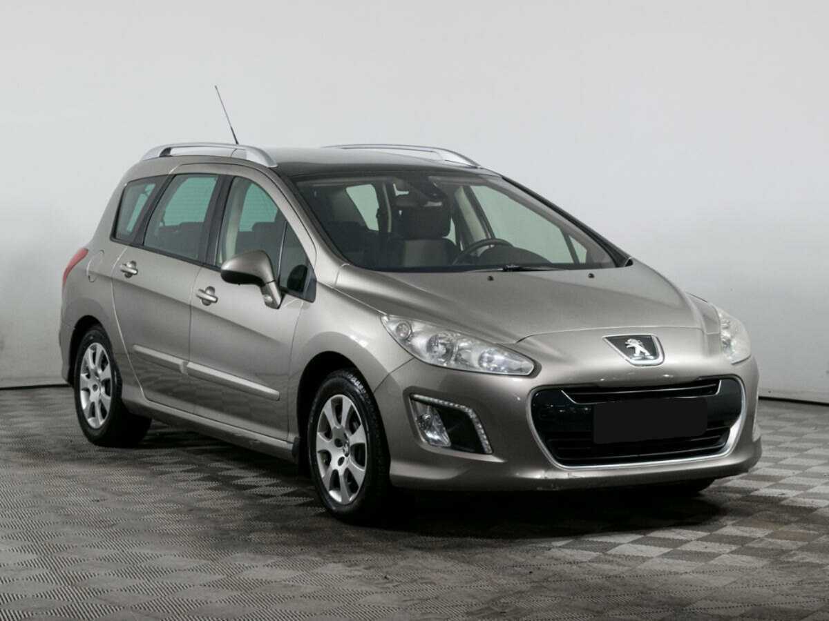 Peugeot 308 2011 года с пробегом. Фото: #2
