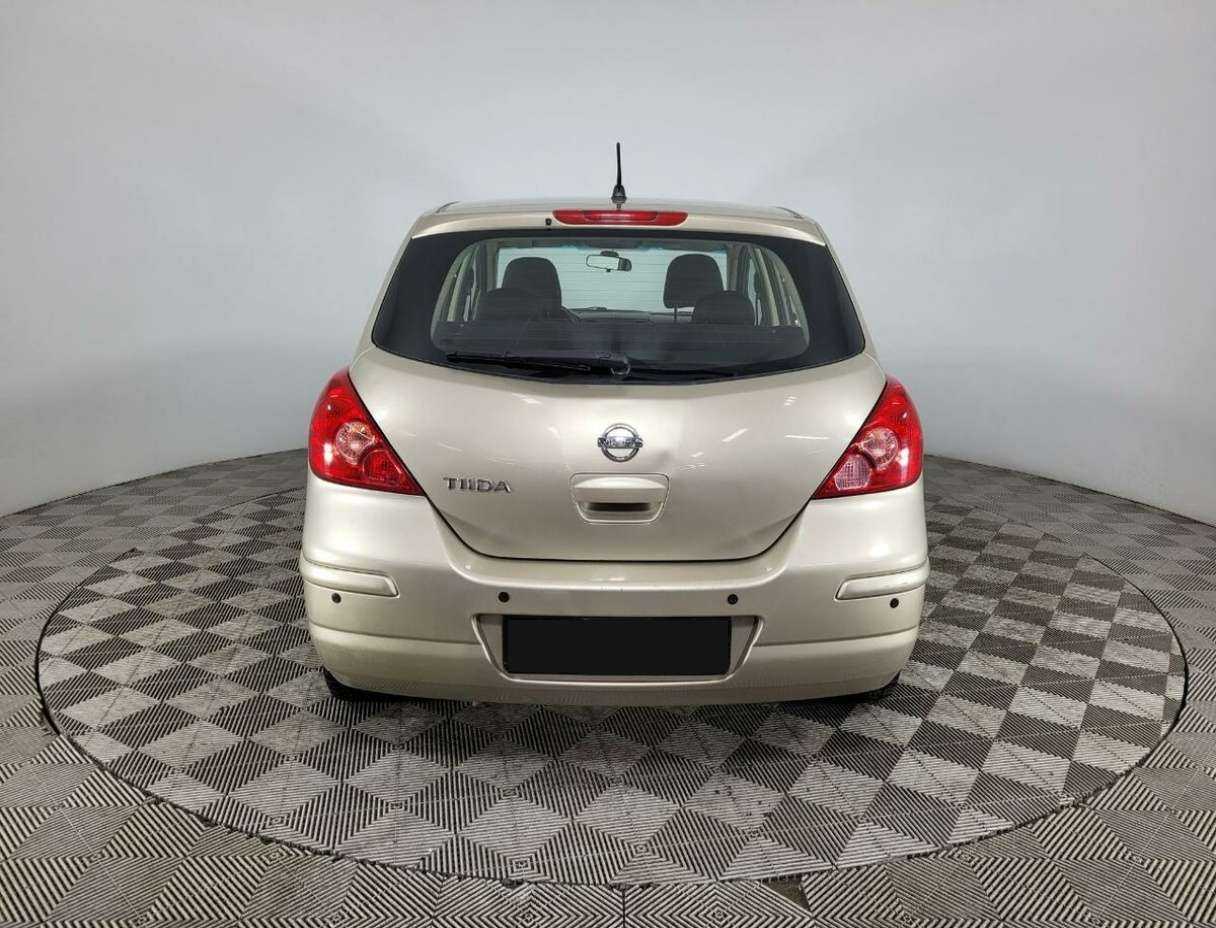 Nissan Tiida 2013 года с пробегом. Фото: #2