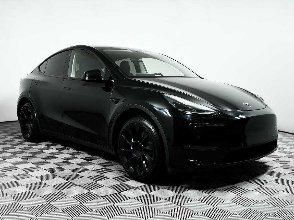 Tesla Model Y 2021 года с пробегом. Фото: #2