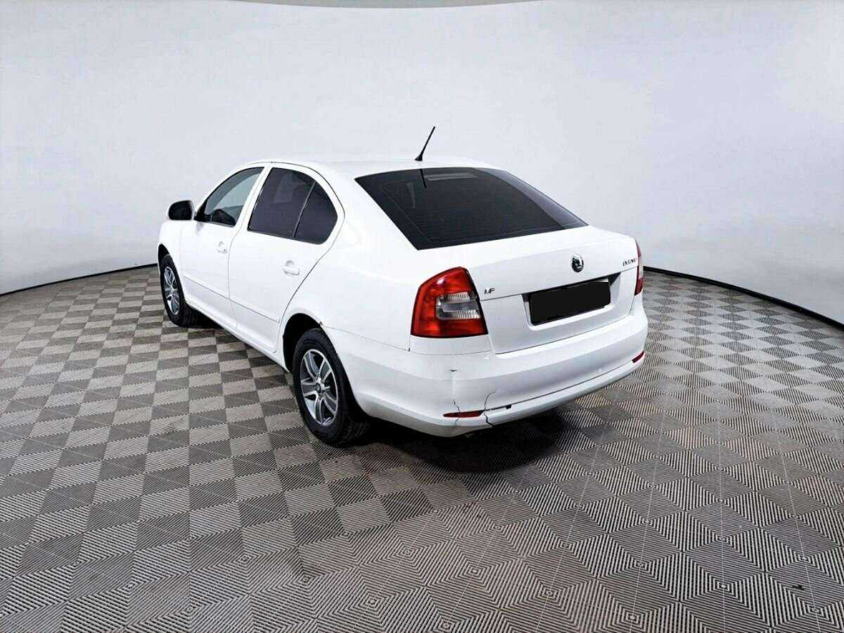 Skoda Octavia 2012 года с пробегом. Фото: #6