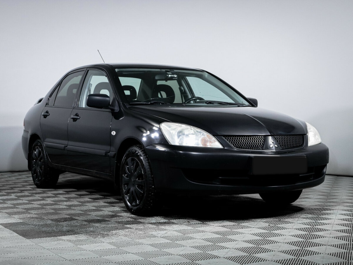 Mitsubishi Lancer 2009 года с пробегом. Фото: #2
