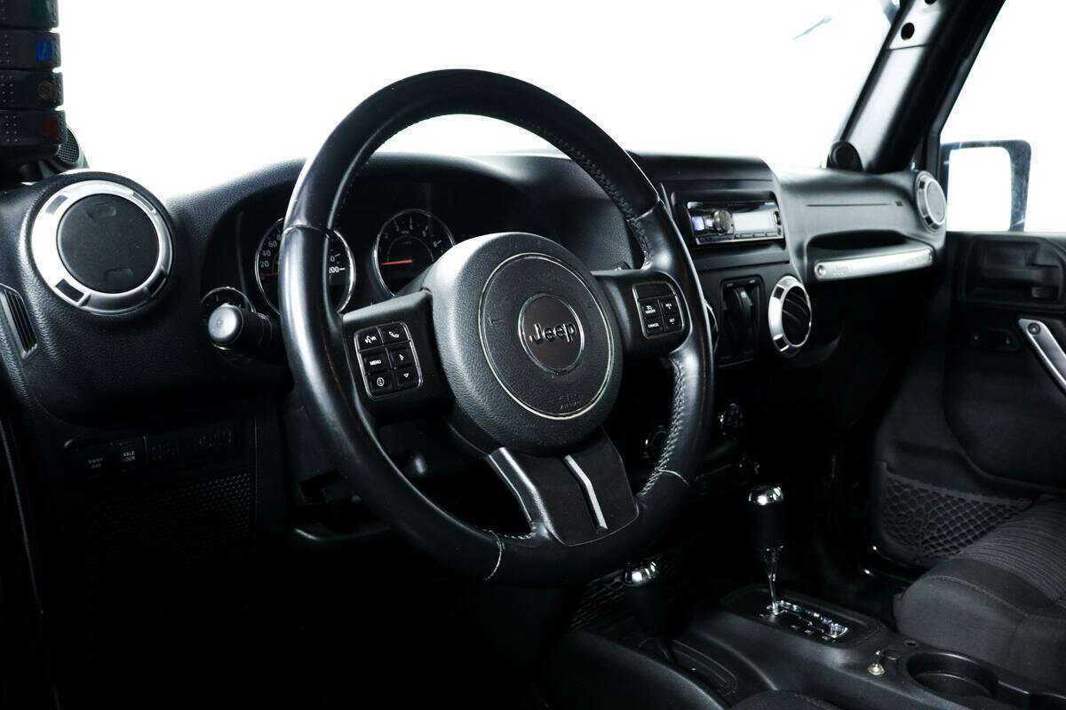 Jeep Wrangler 2012 года с пробегом. Фото: #10