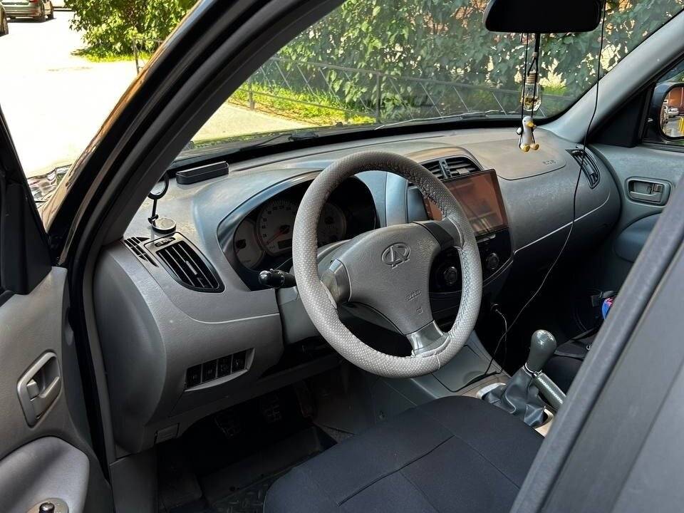 Chery Tiggo (T11) 2009 года с пробегом. Фото: #4