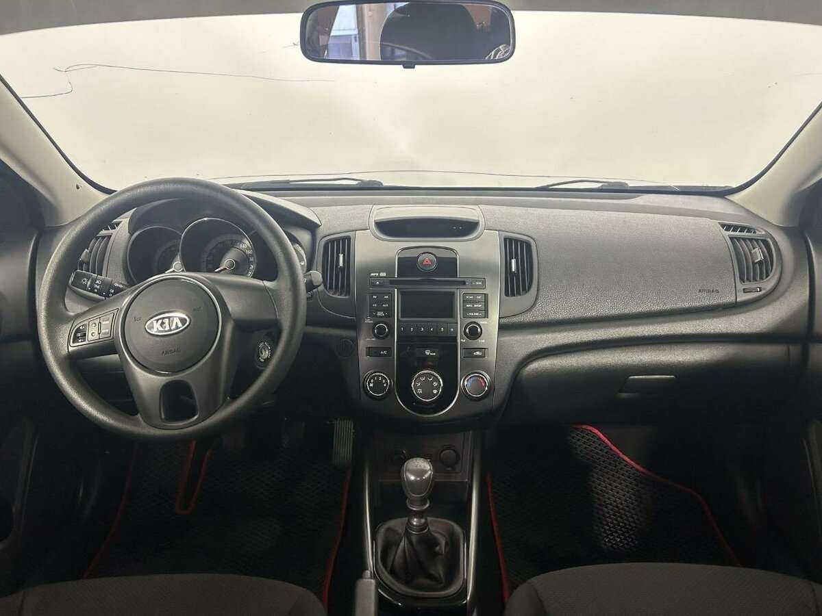 Kia Cerato 2013 года с пробегом. Фото: #4
