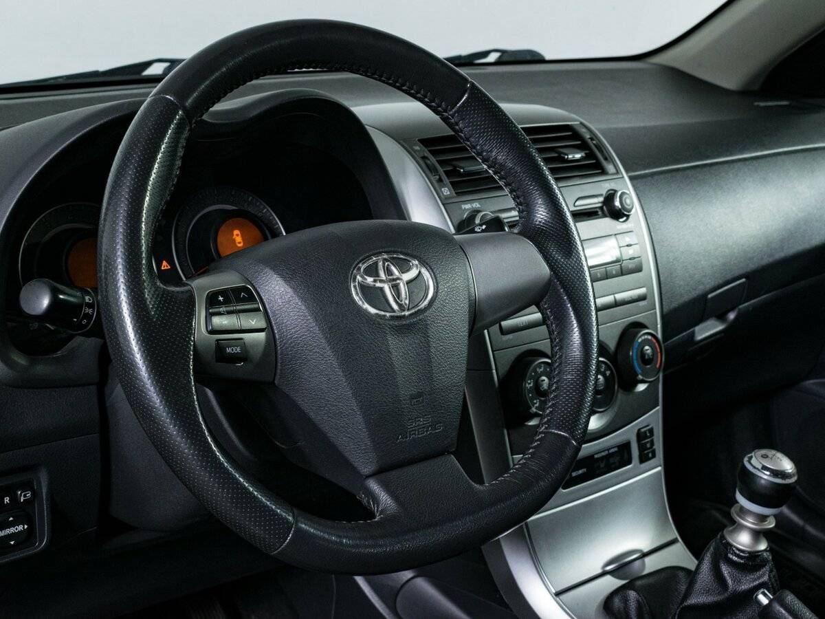 Toyota Corolla 2011 года с пробегом. Фото: #11