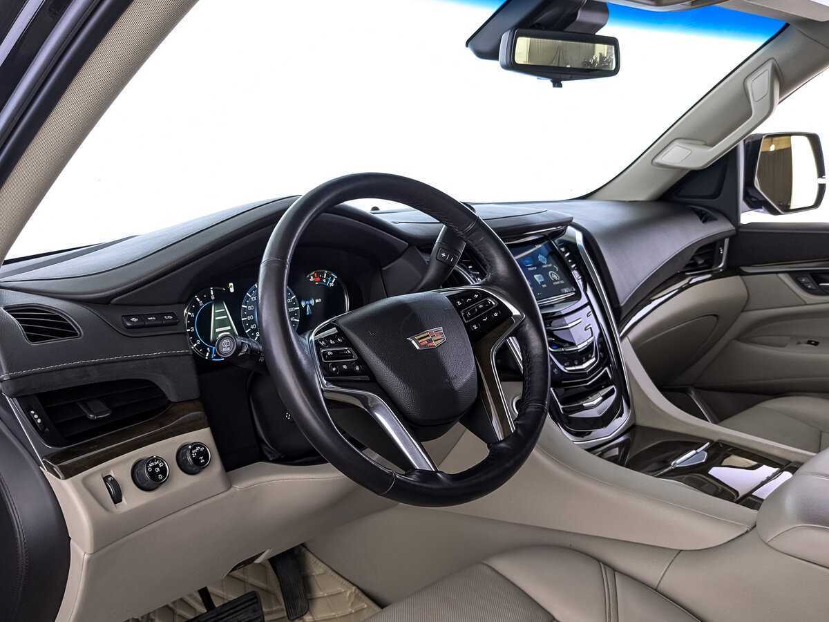 Cadillac Escalade 2019 года с пробегом. Фото: #14