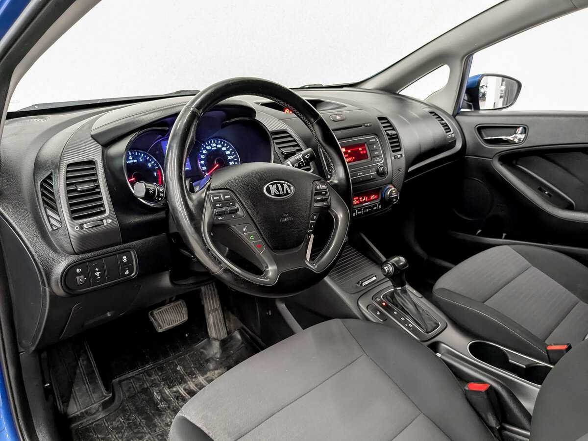 Kia Cerato 2013 года с пробегом. Фото: #15