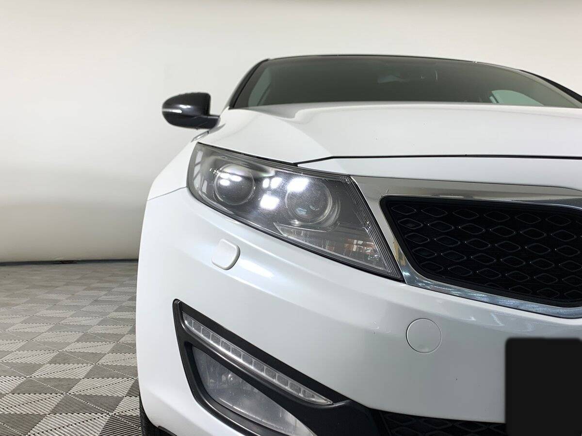 Kia Optima 2011 года с пробегом. Фото: #9