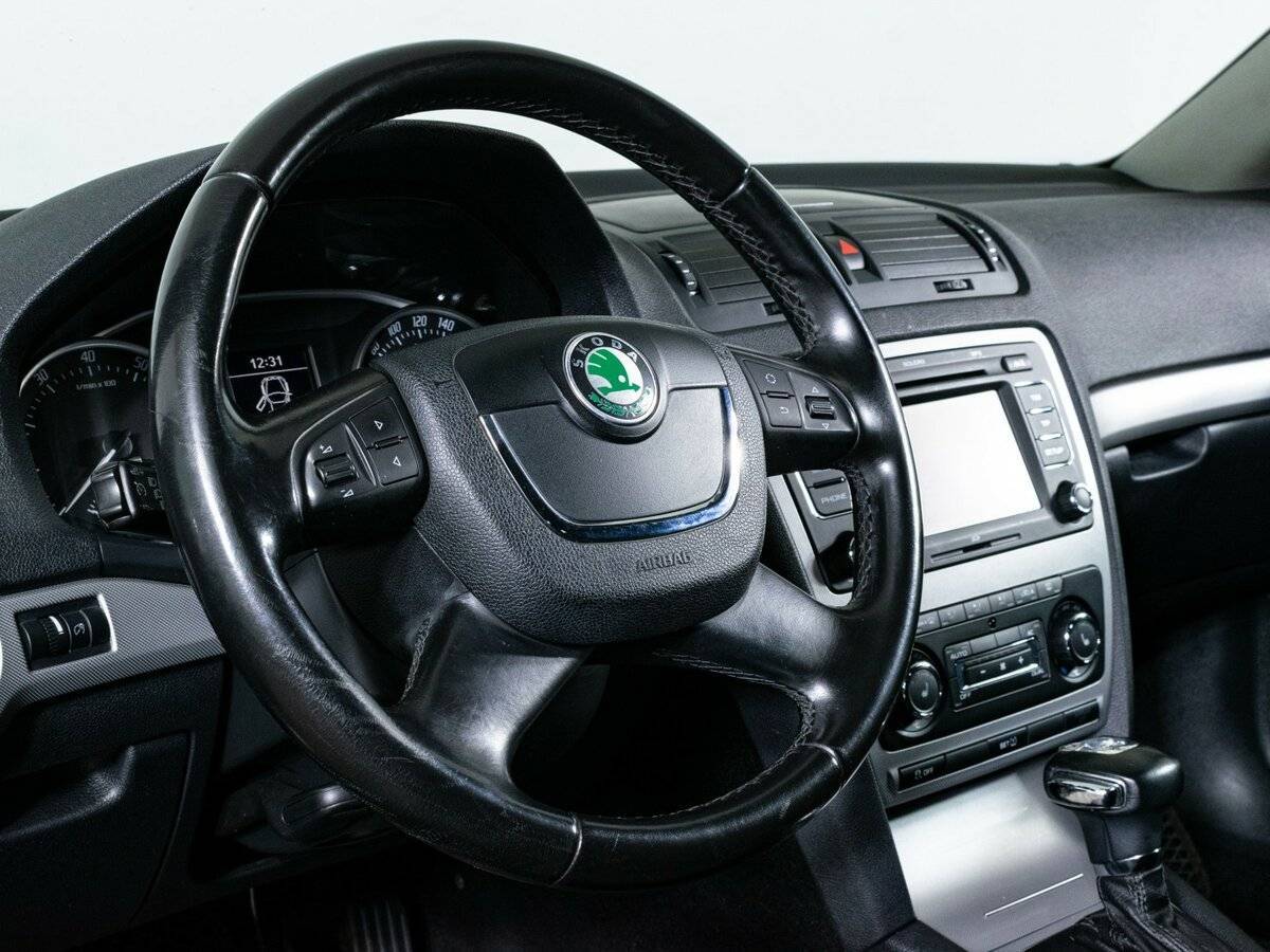 Skoda Octavia 2011 года с пробегом. Фото: #13