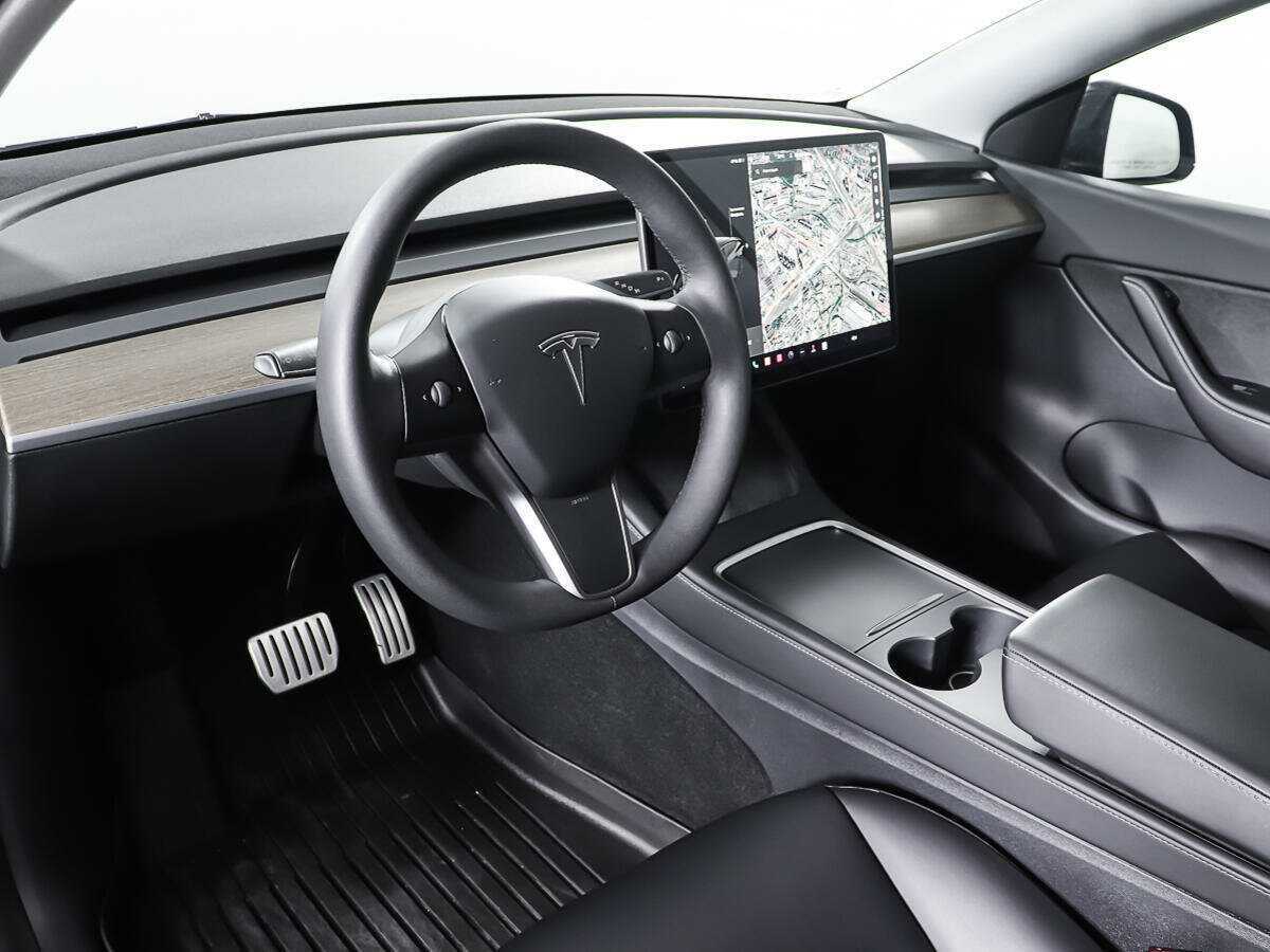 Tesla Model Y 2021 года с пробегом. Фото: #12