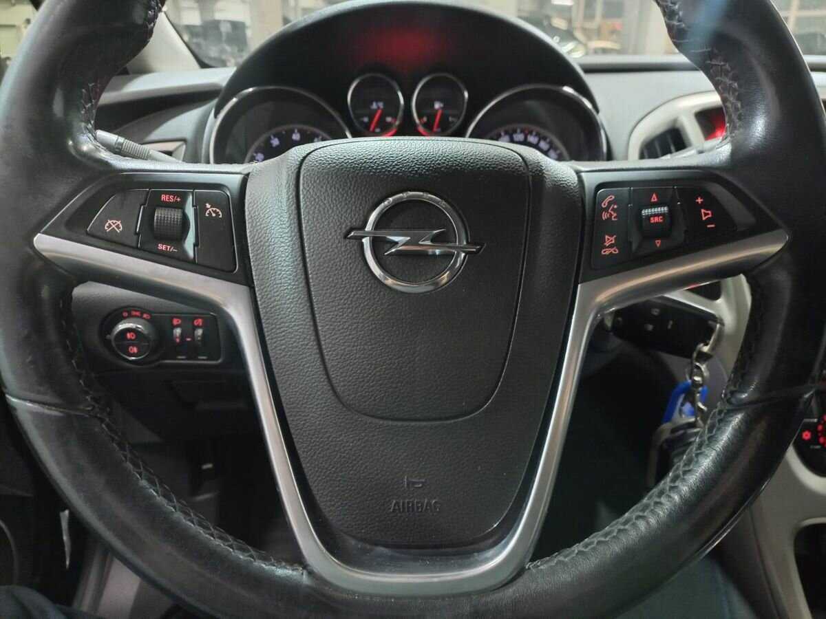 Opel Astra 2010 года с пробегом. Фото: #11