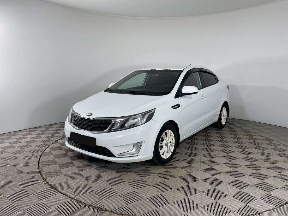 Kia Rio 2013 года с пробегом. Посмотреть фото