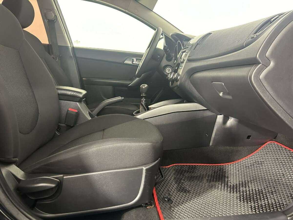 Kia Cerato 2013 года с пробегом. Фото: #11