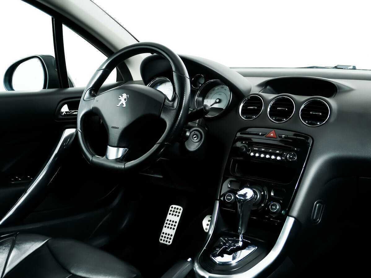 Peugeot 308 2012 года с пробегом. Фото: #8