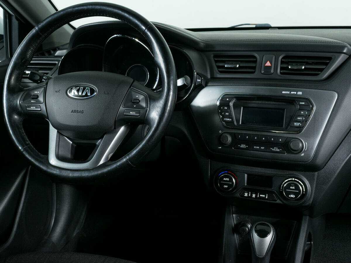Kia Rio 2013 года с пробегом. Фото: #9