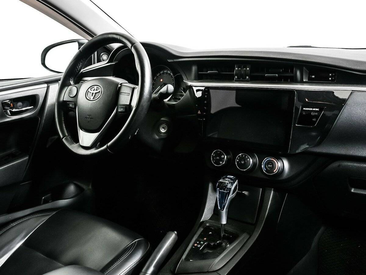 Toyota Corolla 2013 года с пробегом. Фото: #8
