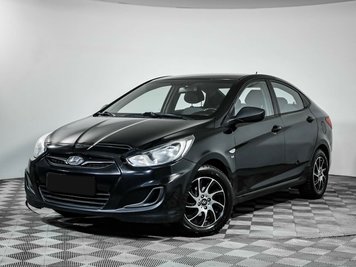 Hyundai Solaris 2013 года с пробегом. Посмотреть фото