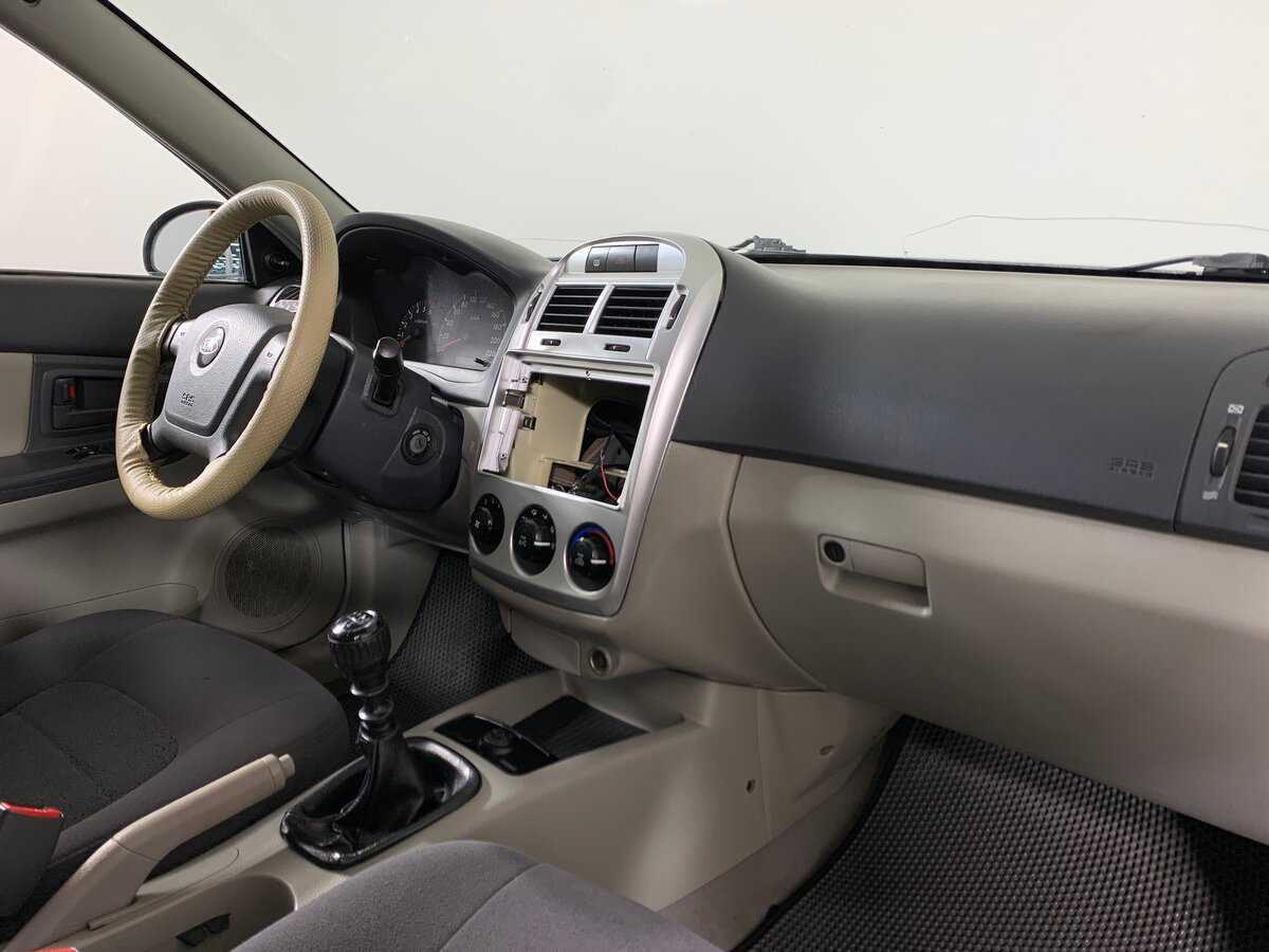 Kia Cerato 2006 года с пробегом. Фото: #12