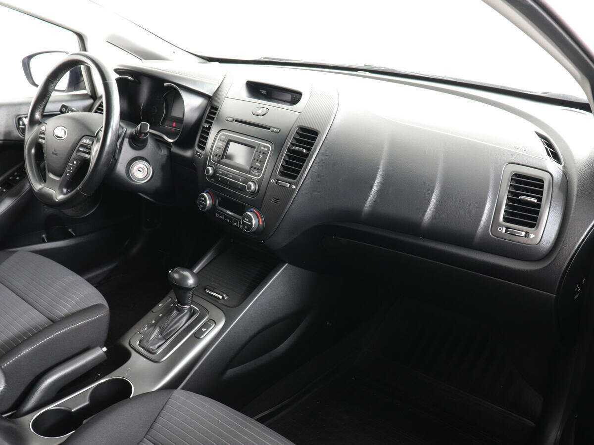 Kia Cerato 2013 года с пробегом. Фото: #9