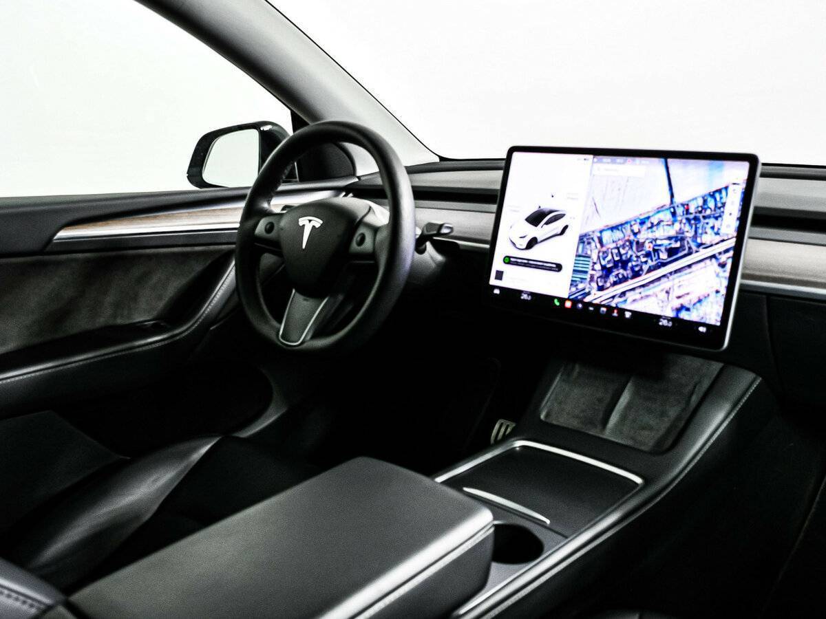 Tesla Model Y 2023 года с пробегом. Фото: #8