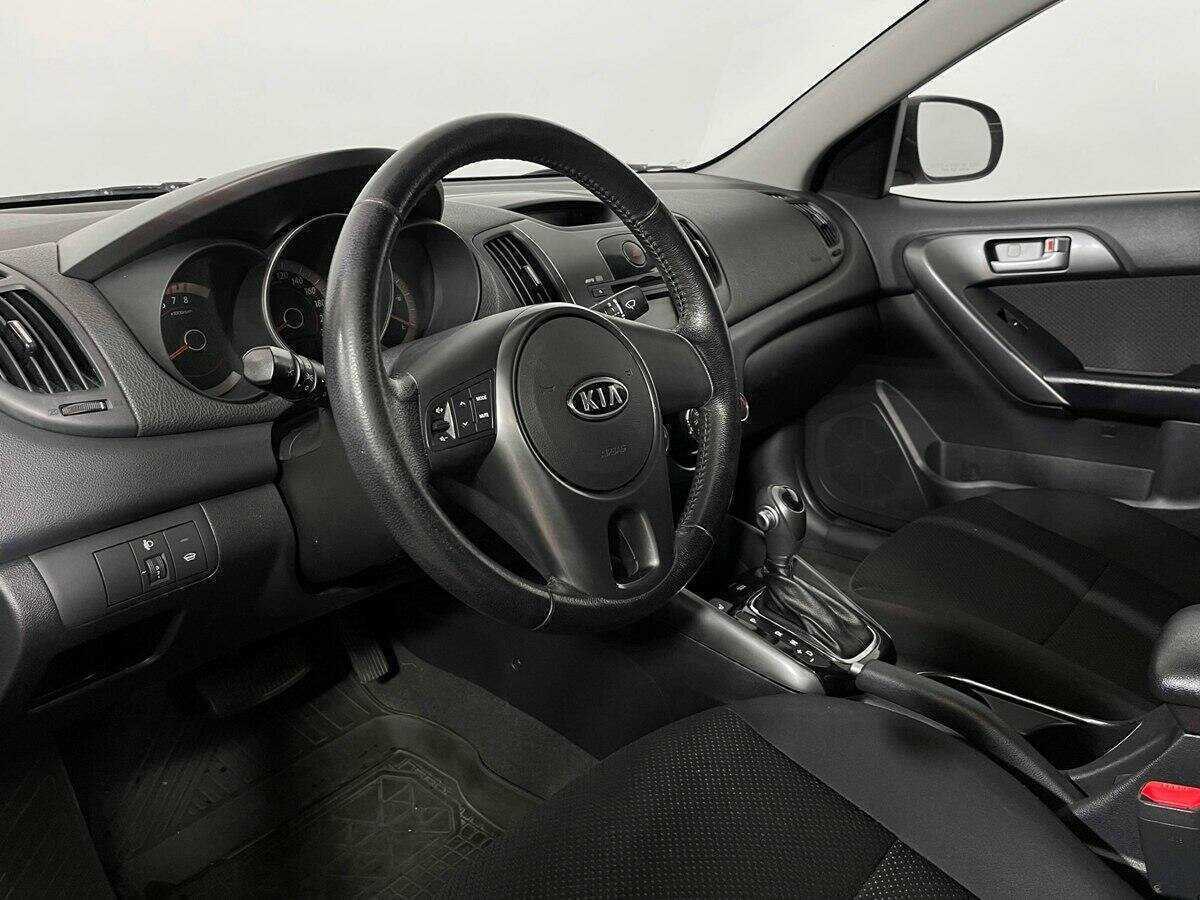 Kia Cerato 2011 года с пробегом. Фото: #10