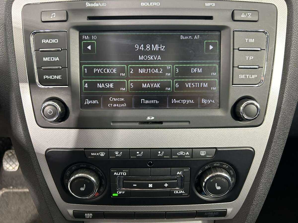 Skoda Octavia 2011 года с пробегом. Фото: #10