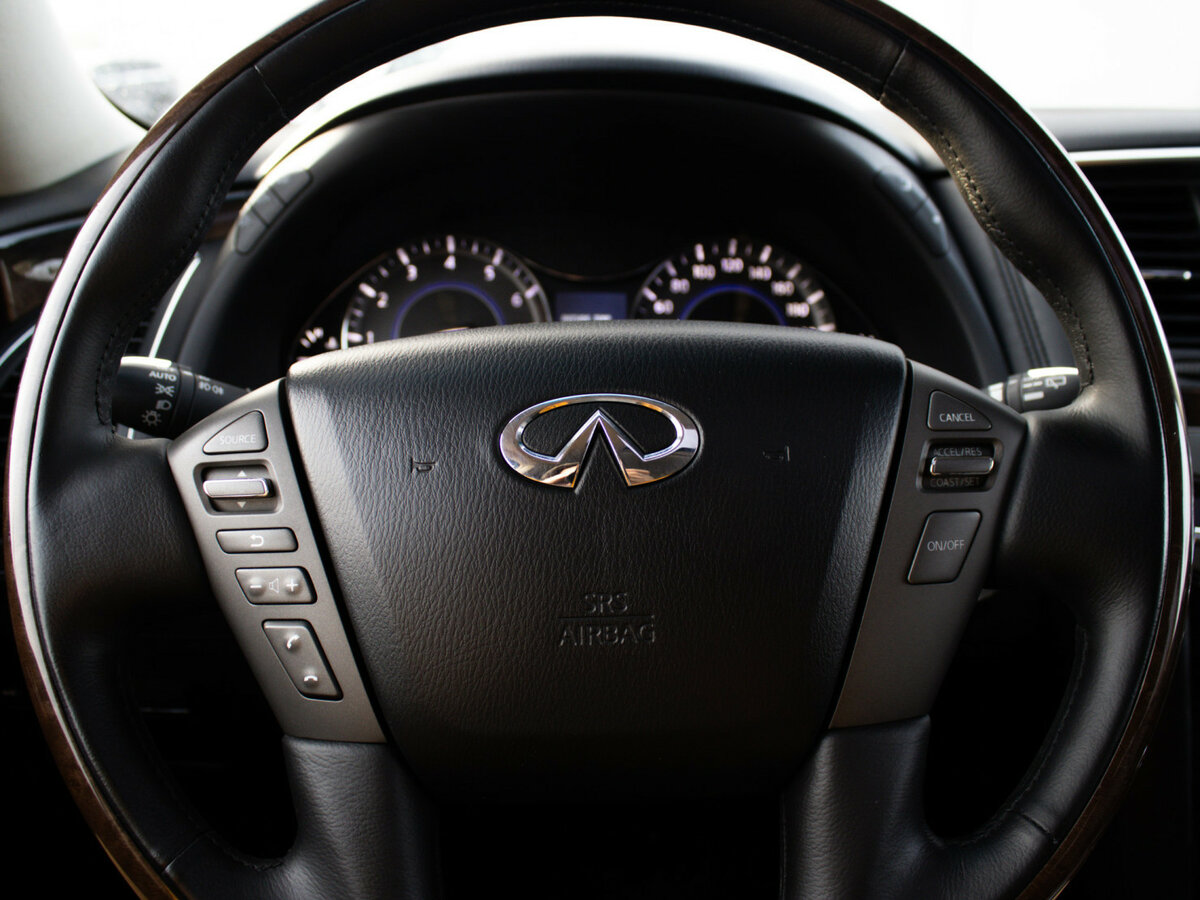 Infiniti QX80 2014 года с пробегом. Фото: #24
