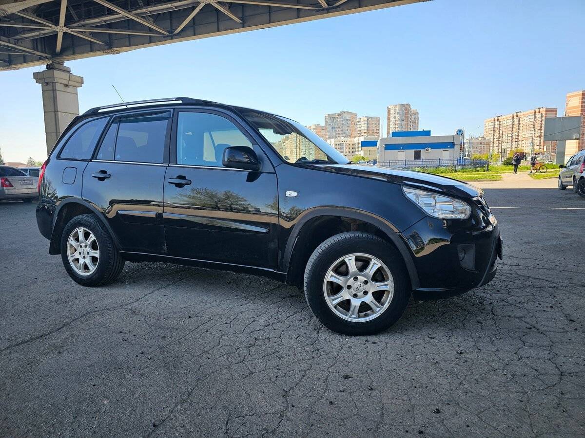 Chery Tiggo (T11) 2013 года с пробегом. Фото: #8