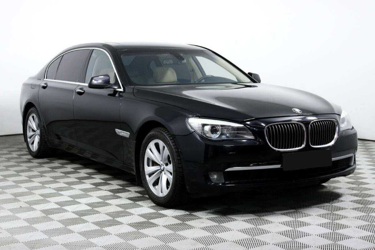 BMW 7 серии 2011 года с пробегом. Фото: #1