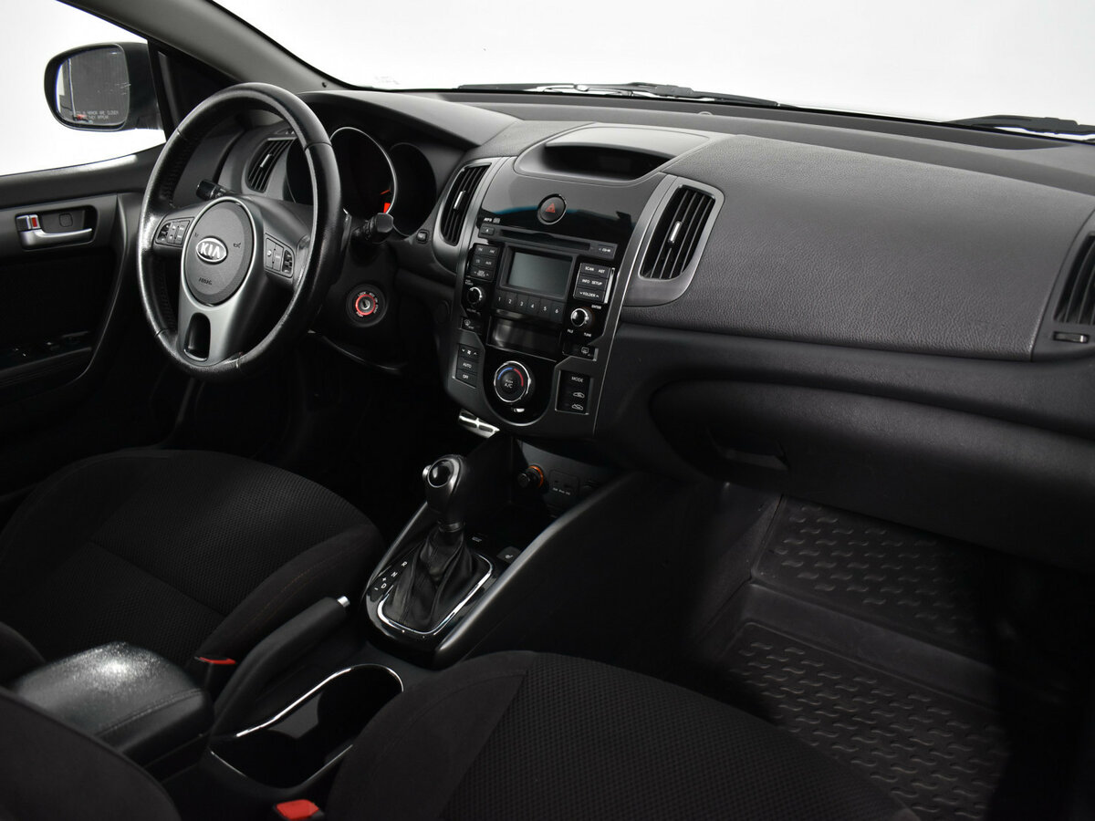 Kia Cerato 2011 года с пробегом. Фото: #9