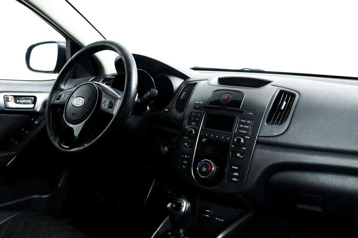 Kia Cerato 2012 года с пробегом. Фото: #8