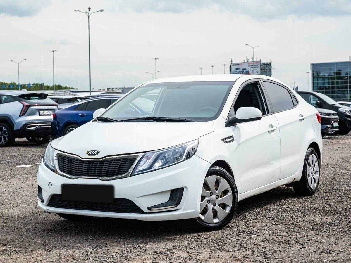 Kia Rio 2014 года с пробегом. Посмотреть фото