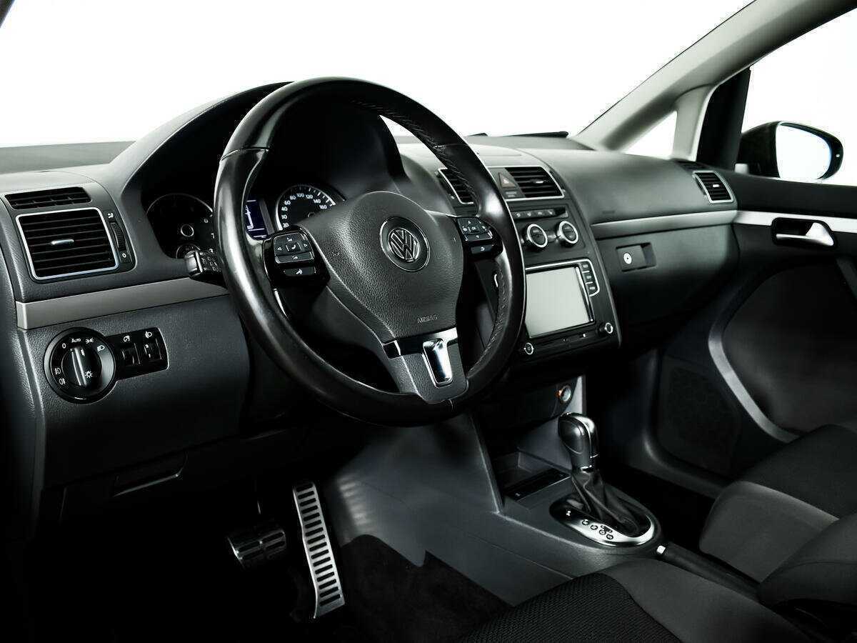 Volkswagen Touran 2013 года с пробегом. Фото: #12