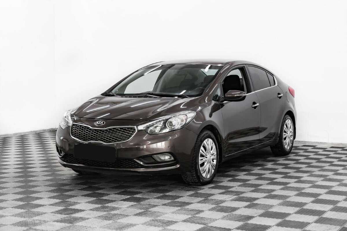 Kia Cerato 2013 года с пробегом. Посмотреть фото