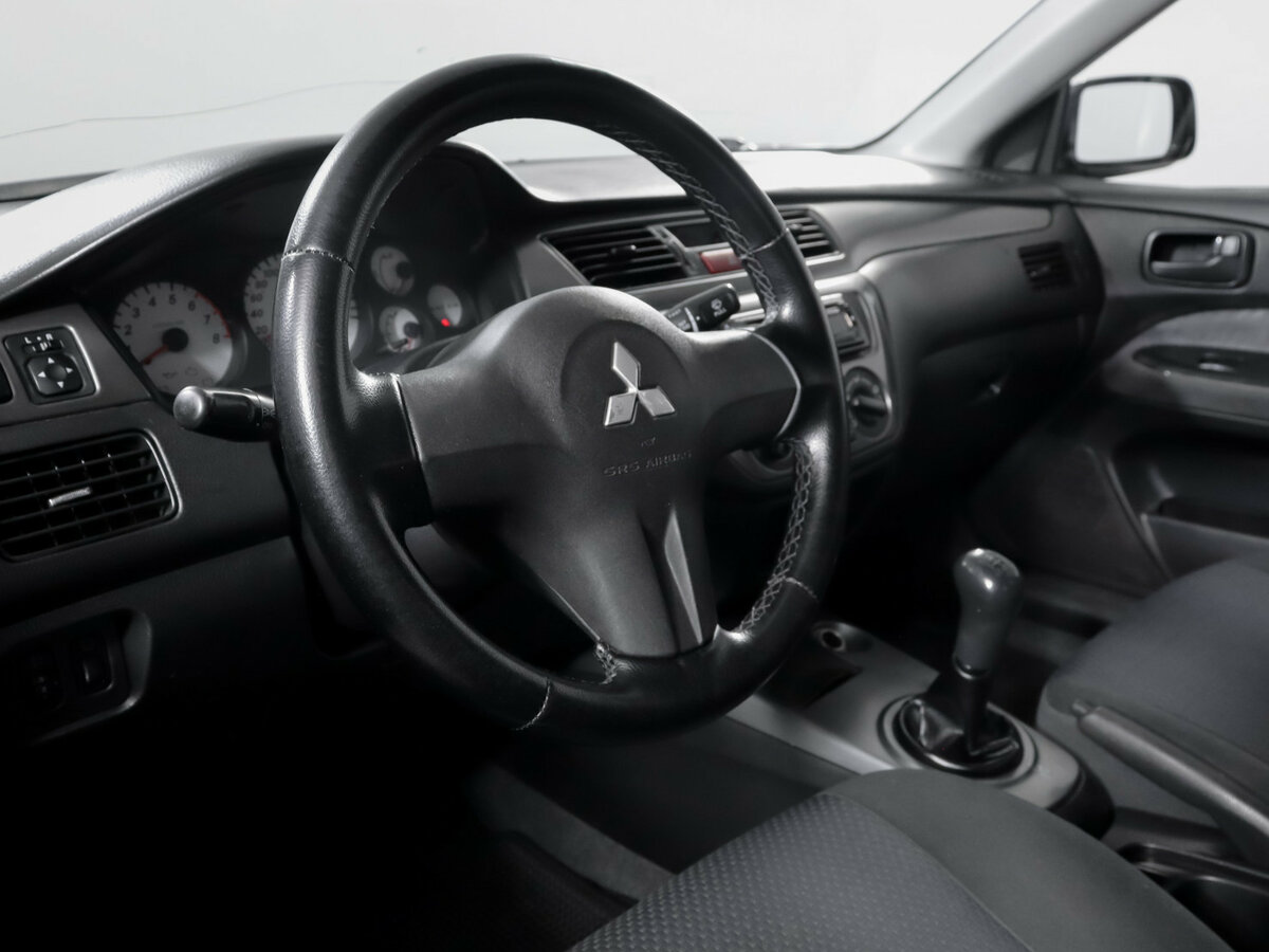 Mitsubishi Lancer 2009 года с пробегом. Фото: #9