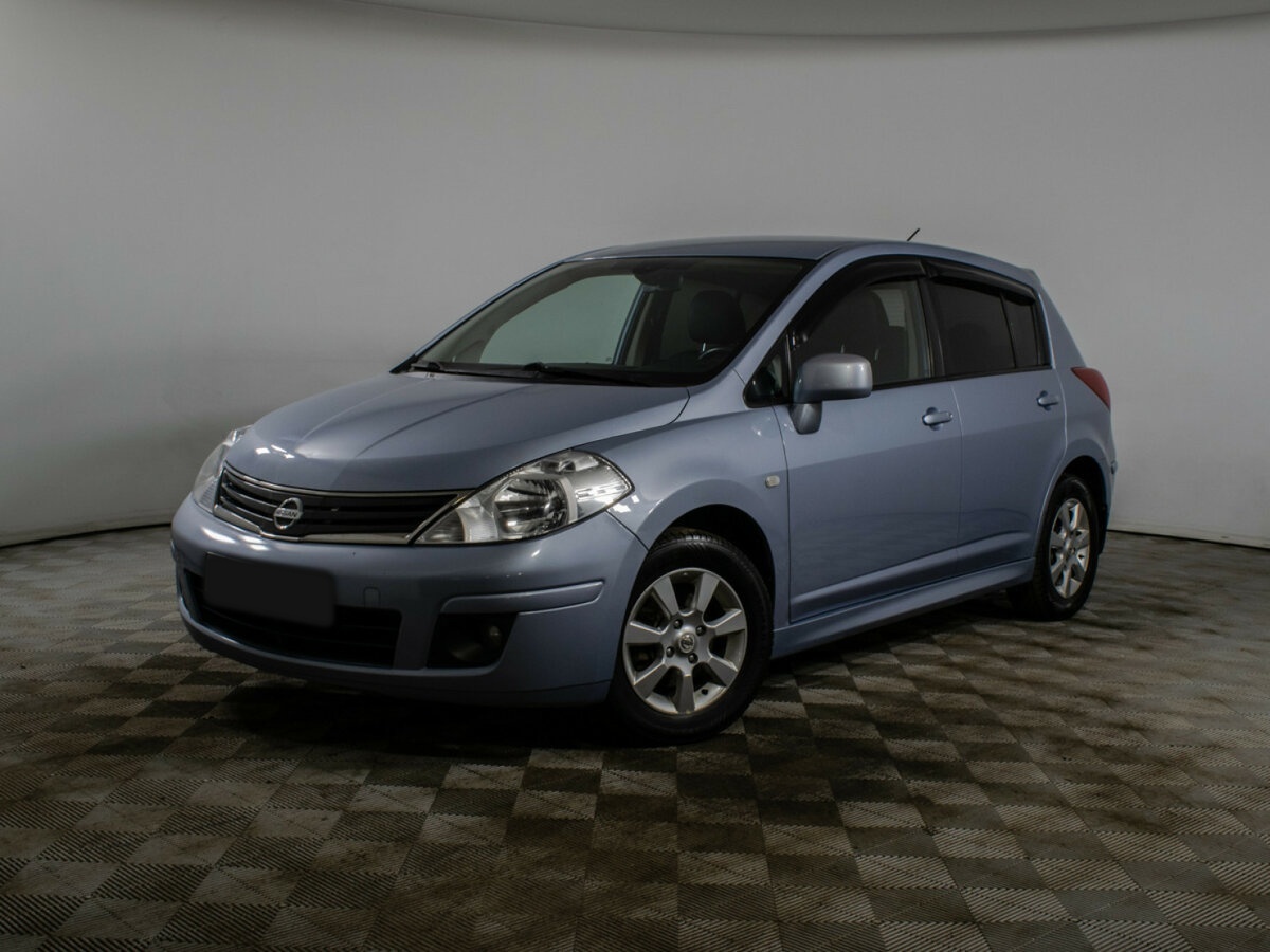 Nissan Tiida 2013 года с пробегом. Посмотреть фото
