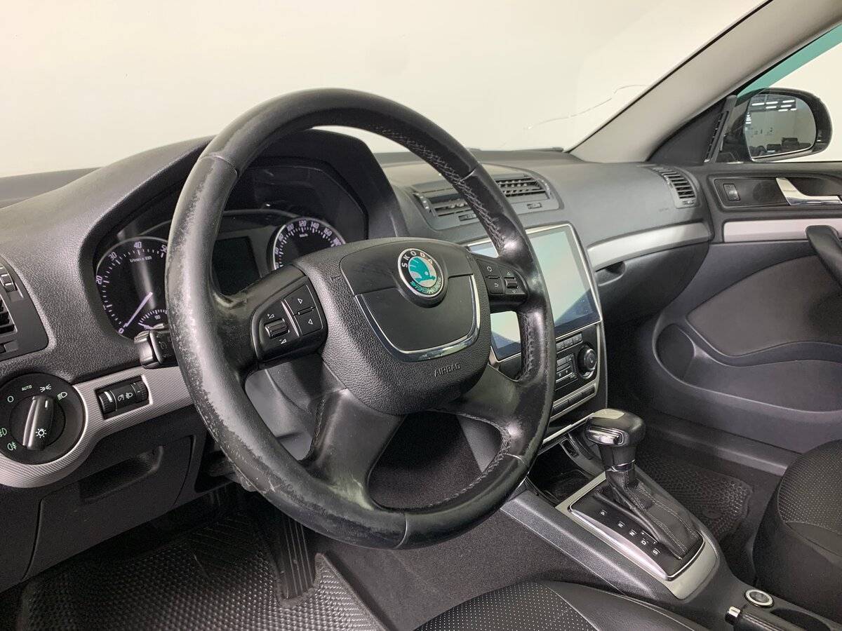 Skoda Octavia 2012 года с пробегом. Фото: #10