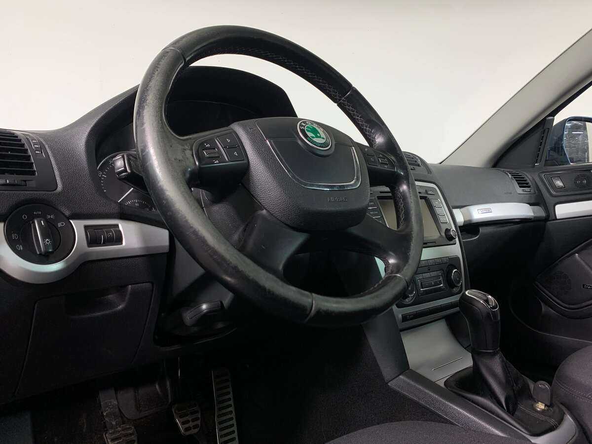 Skoda Octavia 2011 года с пробегом. Фото: #8