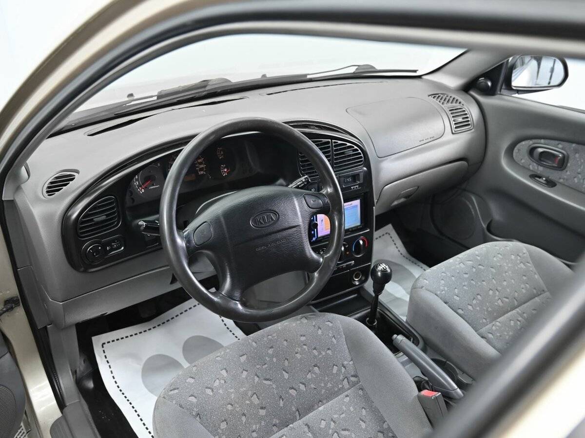 Kia Spectra 2009 года с пробегом. Фото: #8